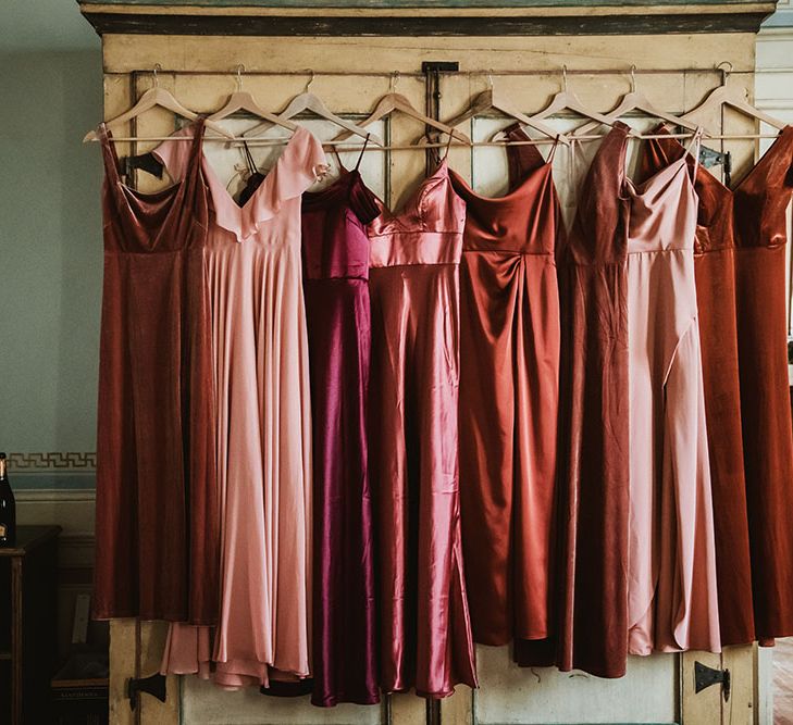 Terracotta orange bridesmaid dresses in different styles and fabrics for Tuscan wedding