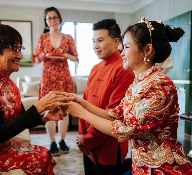 Family & friends gather in Dorchester suite for Chinese Tea Ceremony 