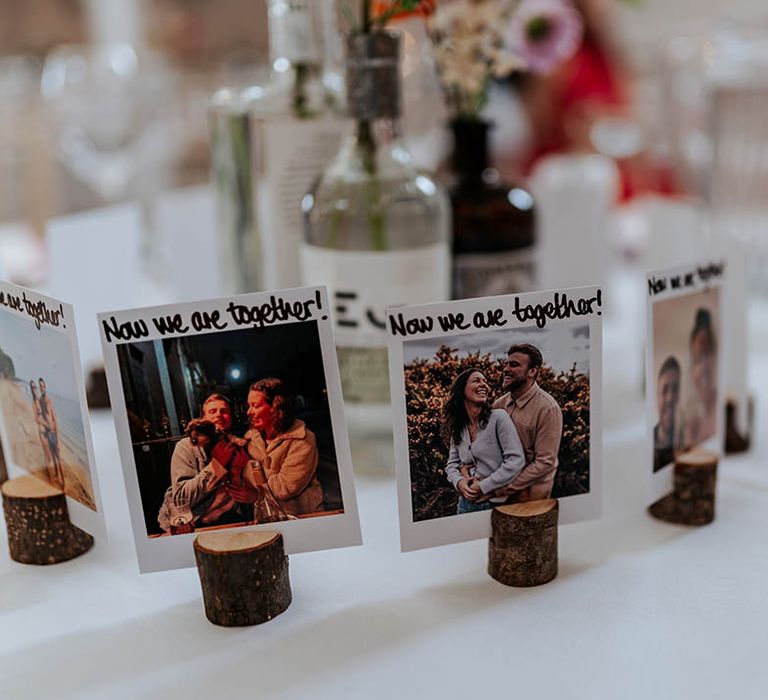 polaroid pictures on corks wedding table decor 