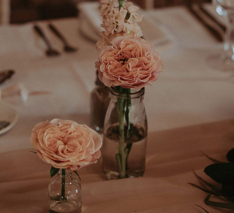 Pink peony wedding flower table decorations for a pink theme romantic and rustic wedding day 