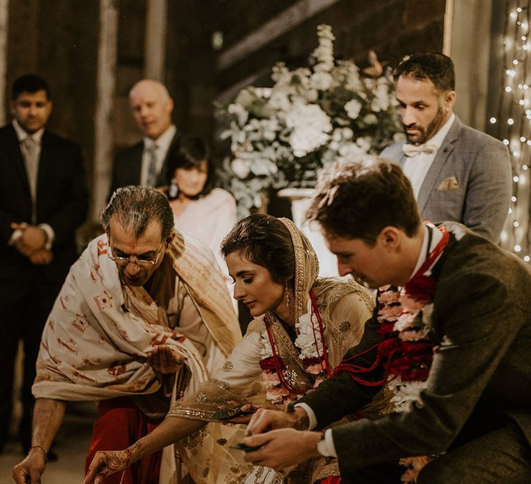 Interfaith Hindu blessing wedding ceremony uniting the bride and groom 