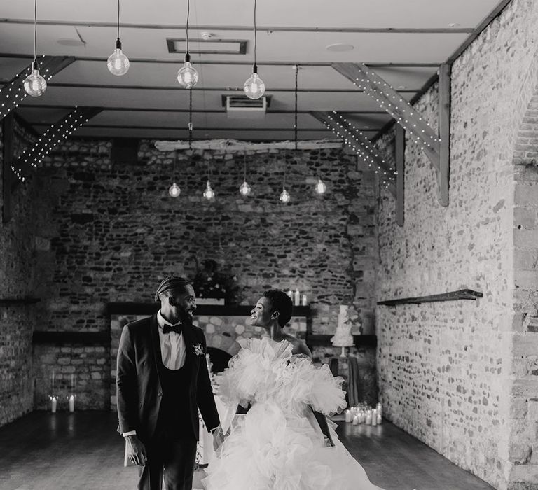 Bride and groom in Pentney Abbey wedding in the countryside of Norfolk 