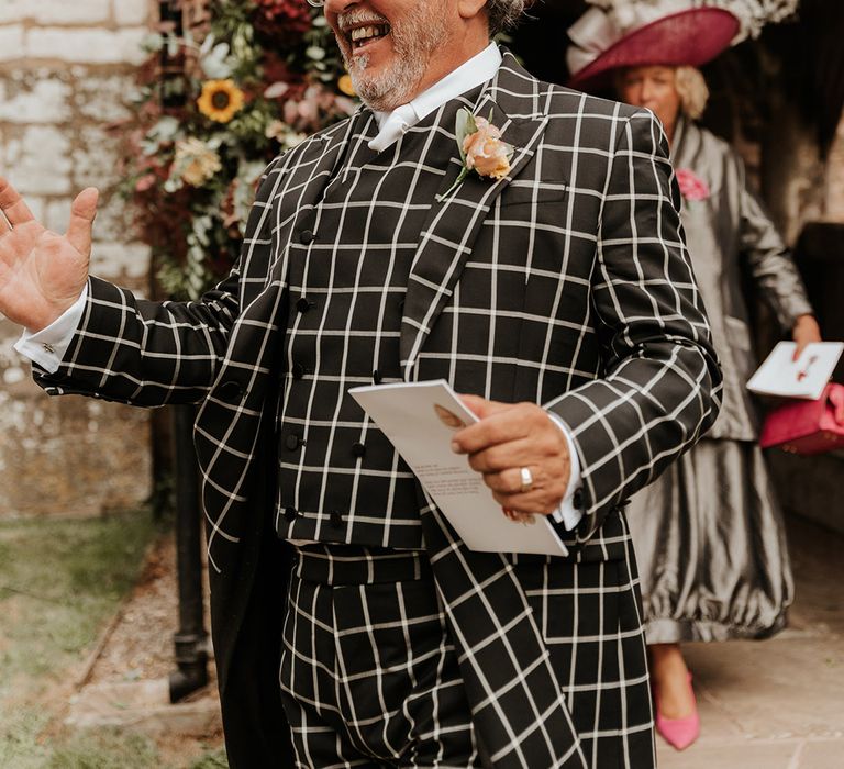 Father of the bride in black and white checkered three piece suit 