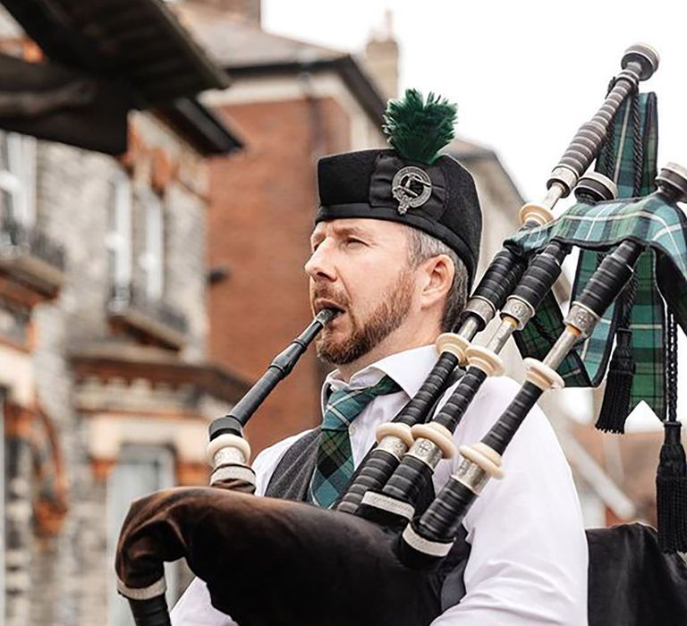 Bagpipe player at wedding event 