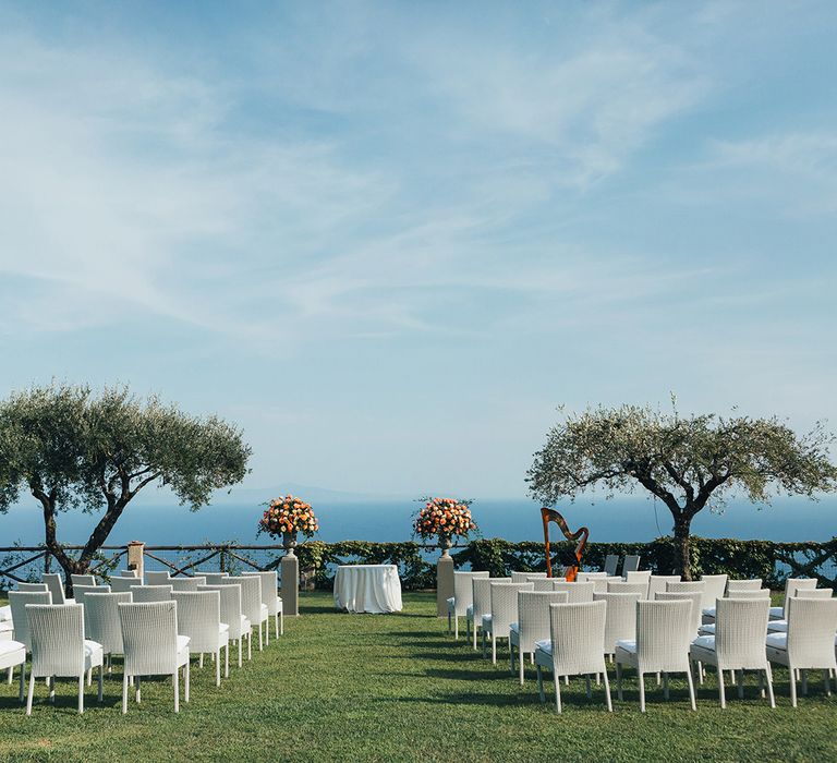 Outdoor ceremony at Villa Cimbrone, Ravello, Italy overlooking the Amalfi coast 