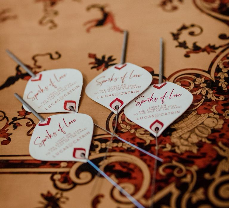 Four 'sparks of love' wedding sparklers for 1960s themed micro wedding