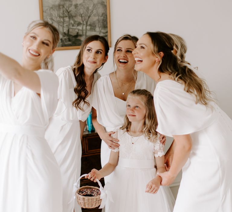 Bridal party takes selfie on wedding day