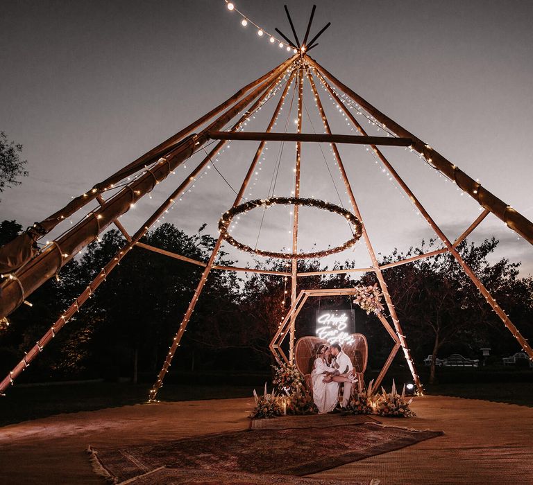 Naked tipi decorated with fairy lights at The Secret Garden Kent 