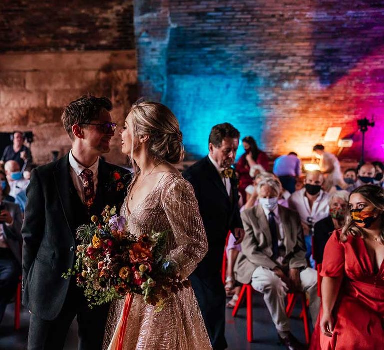 Bride & groom kiss on their wedding day