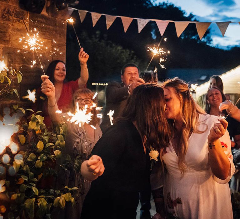 Lesbian wedding with two brides having sparkler send off at the end of the evening at The Parlour, Blagdon