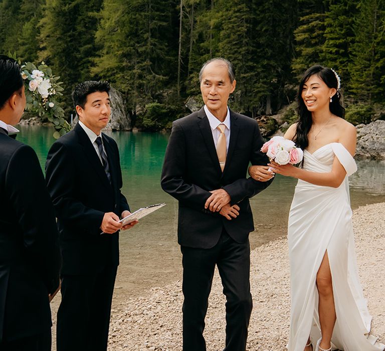 Outdoor wedding ceremony in Italy with a black tie dress code