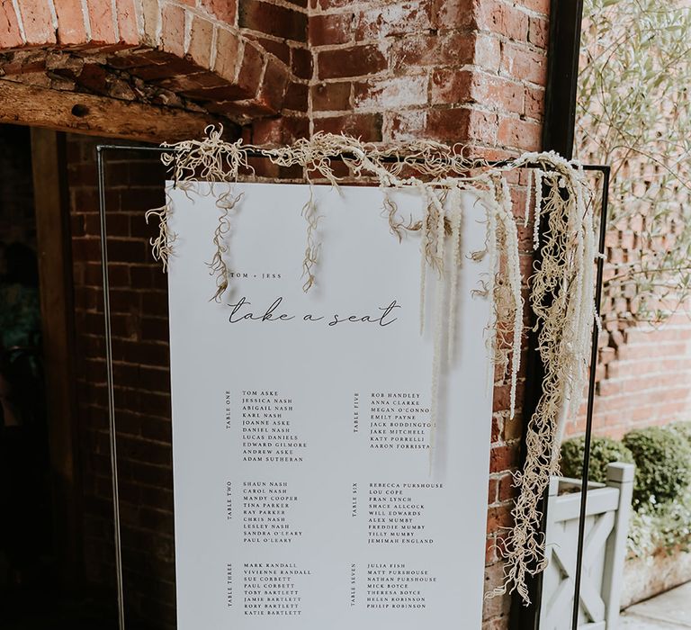 Black and white classic wedding seating chart for minimalist wedding at Shustoke Barns 