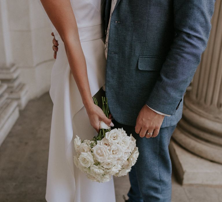 All white rose wedding bouquet for intimate wedding 