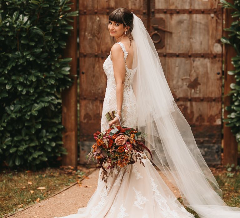 Bride in Abbie Maggie Sottero wedding dress