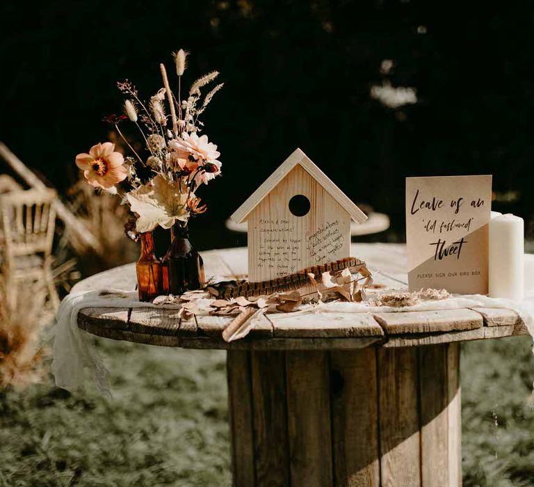 Wooden bird house for sustainable wedding guest book inspiration