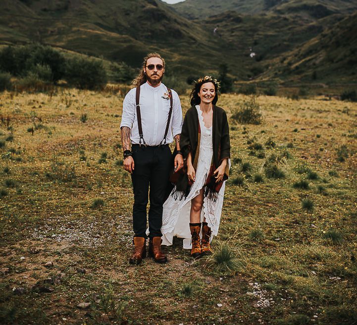 Bride & groom stand together after wedding ceremony in the Lake District