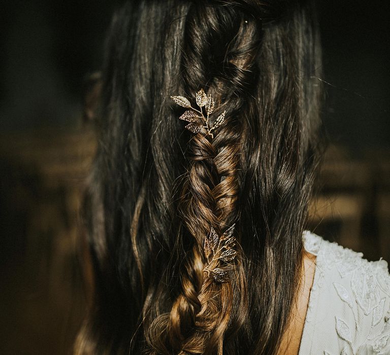 Half up half down bridal braid with leaf hair accessory 