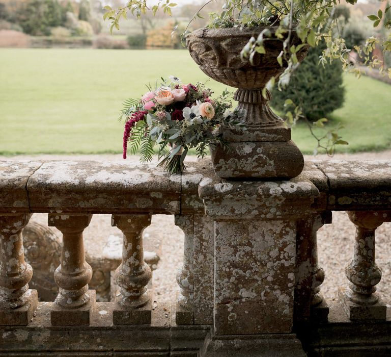 Berry wedding bouquet at Brympton House wedding venue