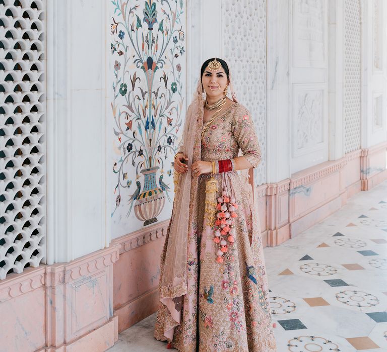 Bride stands outside Guru Nanak Darbar