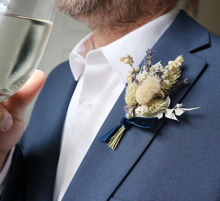 Oxford blue dried flower buttonhole