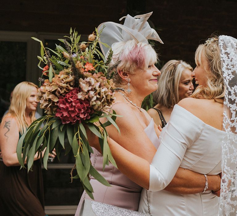 Bride wears subtle embellished veil on her wedding day