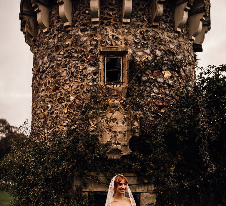 Martina Liana wedding dress with lace trim veil