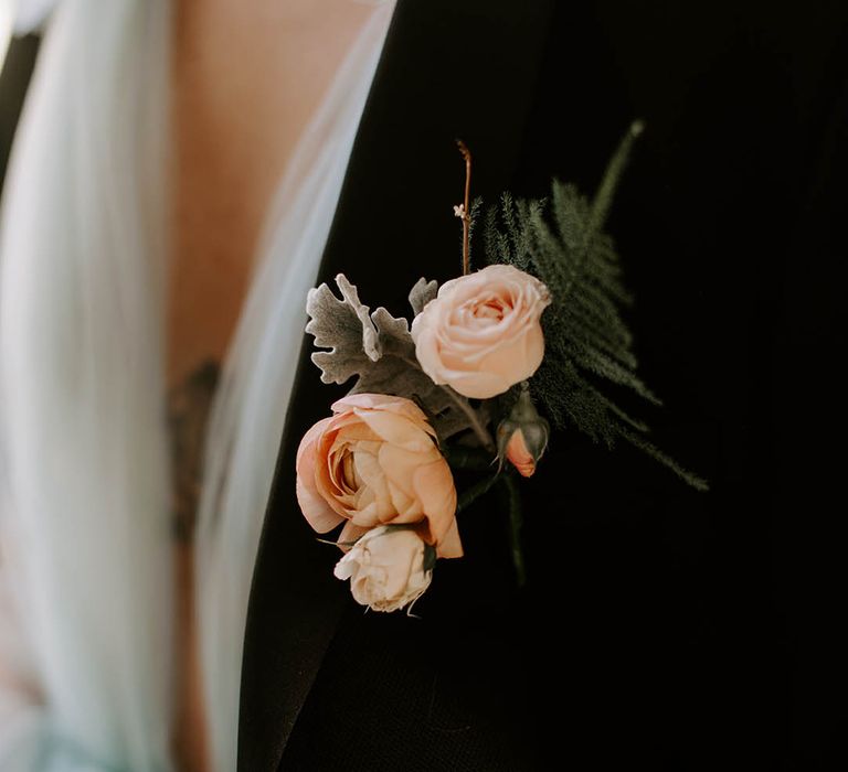 delicate peach buttonhole flower 