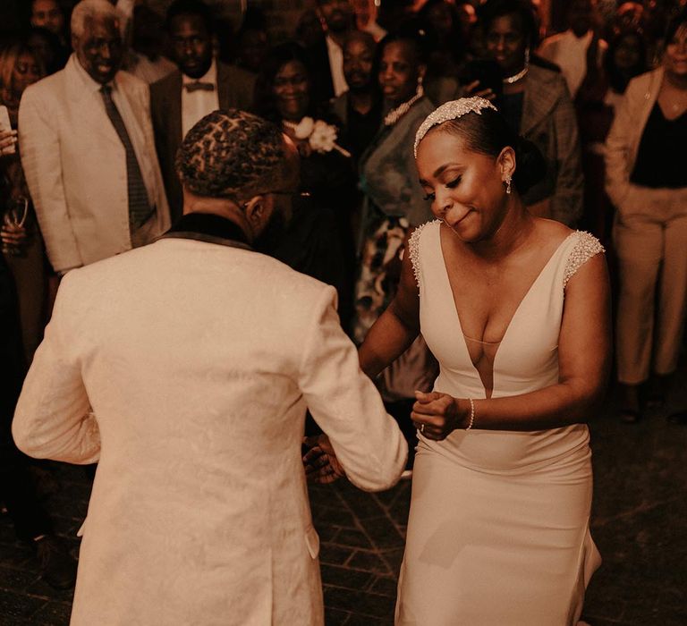 First dance with bride in Pronovias wedding dress with plunging neckline 