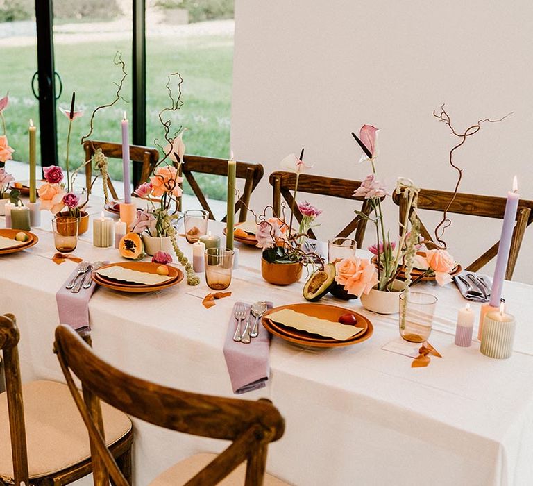 Lavender, green and rust wedding tablescape for an autumnal wedding at Chapel House Estate