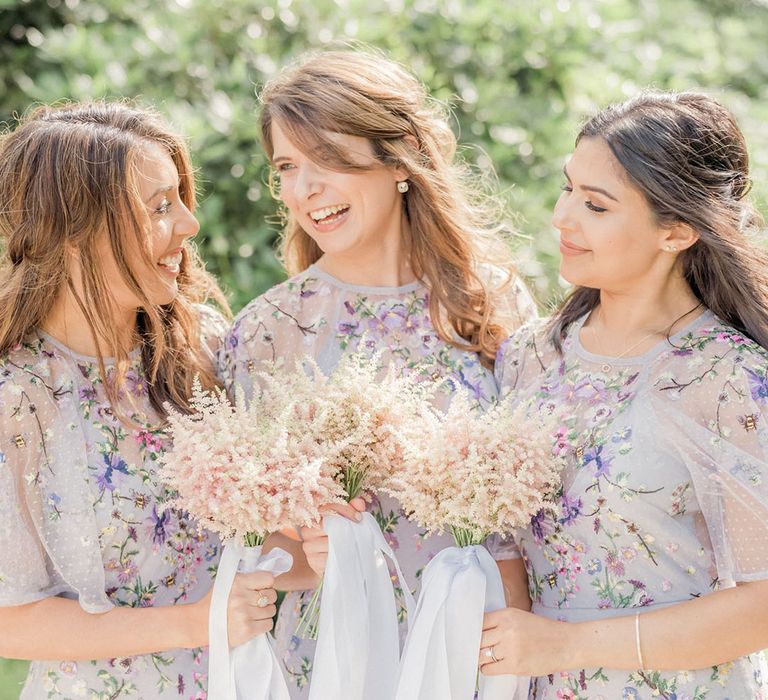 Delicate blue and purple floral embroidered bridesmaid dresses for botanical wedding 