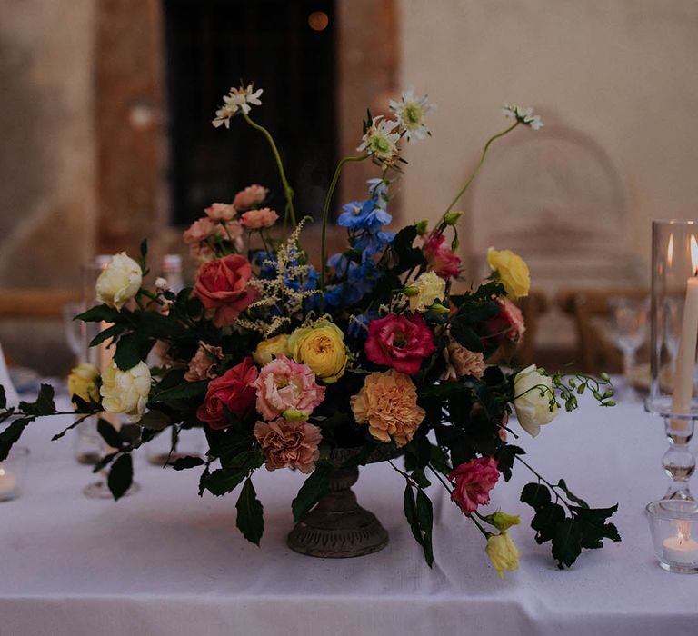 blue pink yellow wedding flower arrangements 