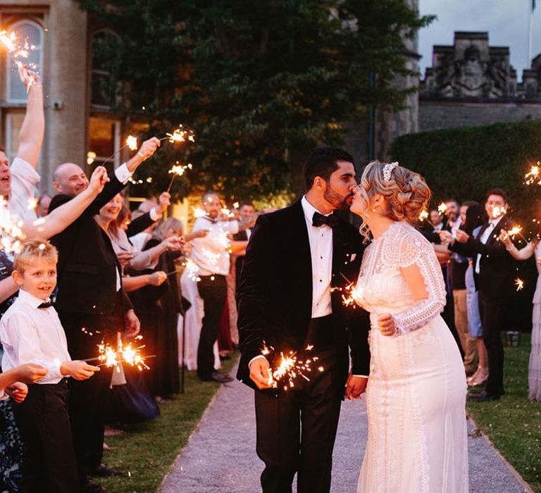 Sparkler send off for the bride and groom at their luxe black tie wedding 