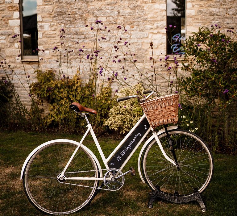 vintage bicycle with basket and chalkboard sign wedding decor 