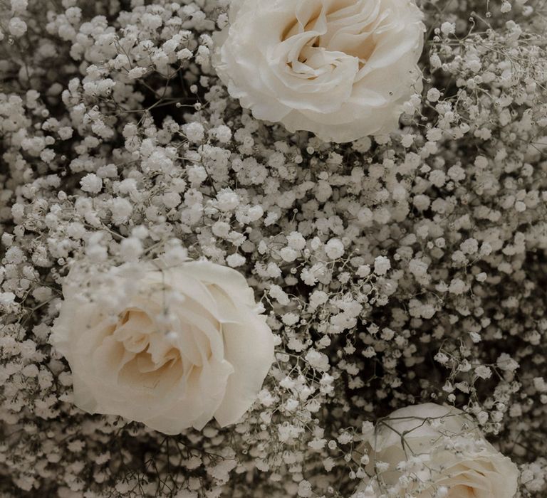 Gypsophila and white rose wedding flower arrangements 