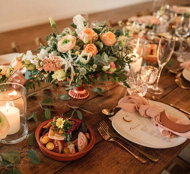 Peach and white summer wedding flower table arrangement with bowl arrangements 