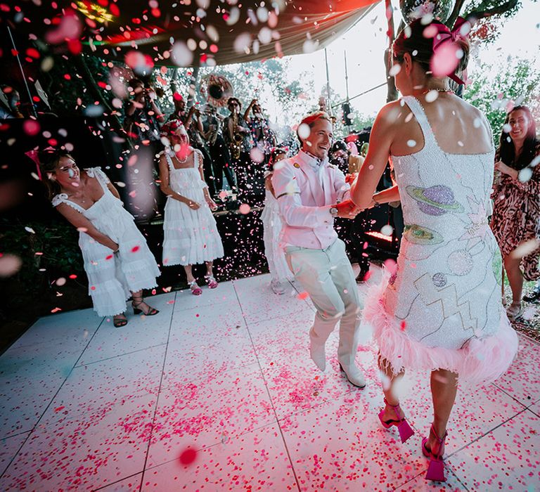 Confetti moment for the bride and groom during their first dance 