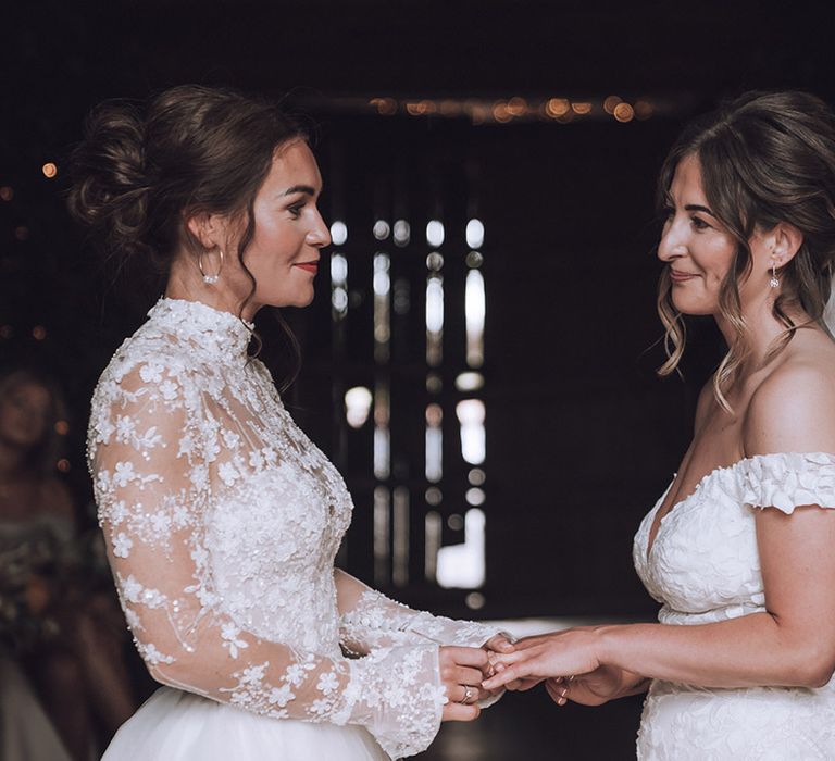 Stone Barn wedding ceremony with two brides at their same sex wedding ceremony 