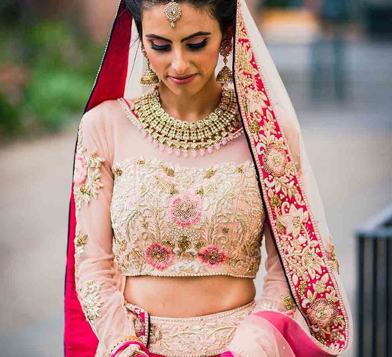 Beautiful bride in traditional wedding dress for Hindu fusion wedding