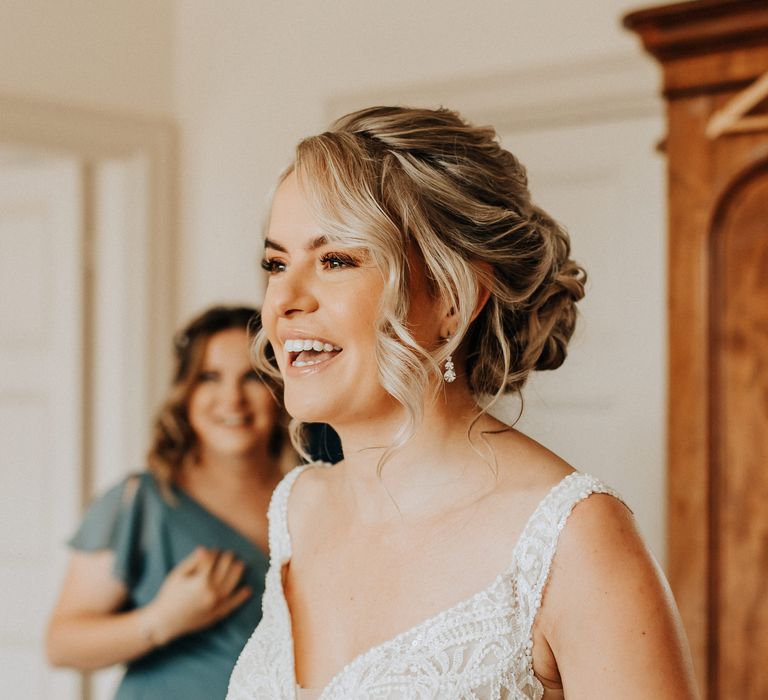 Beautiful bride with undo and drop earrings