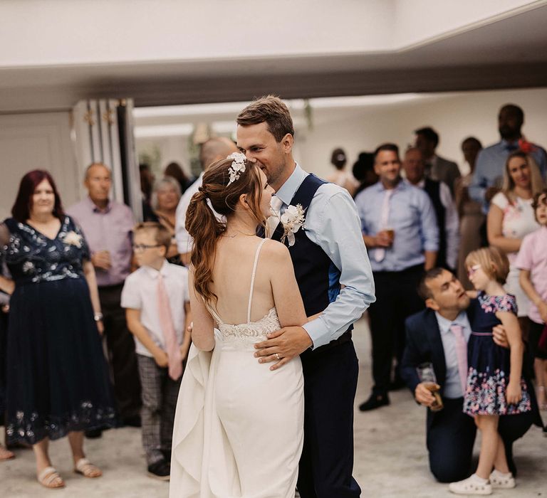 Bride & groom dance during their wedding reception 