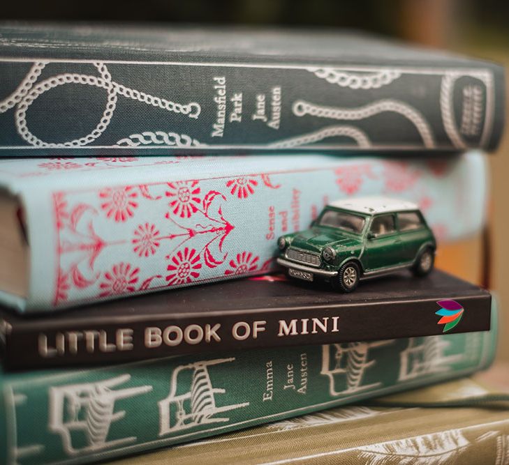 Classic books with colourful covers and small toy car