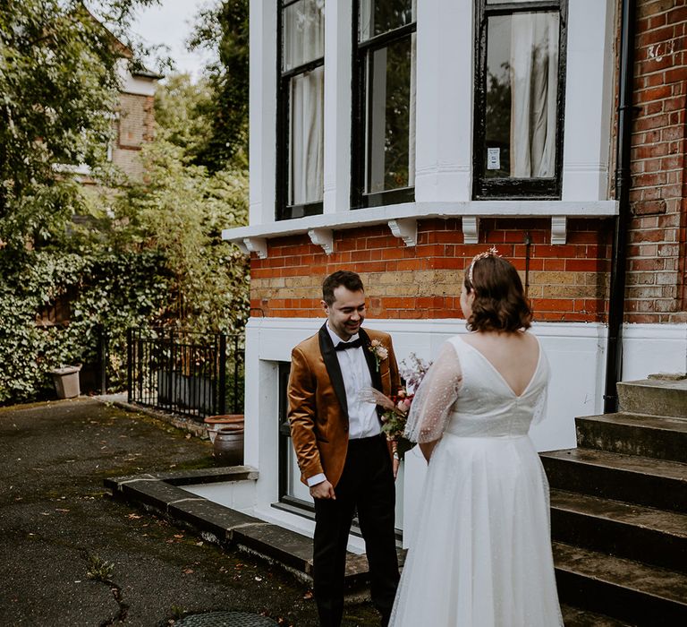 Bride and Groom do an emotional first look at home before their ceremony at The Asylum Chapel