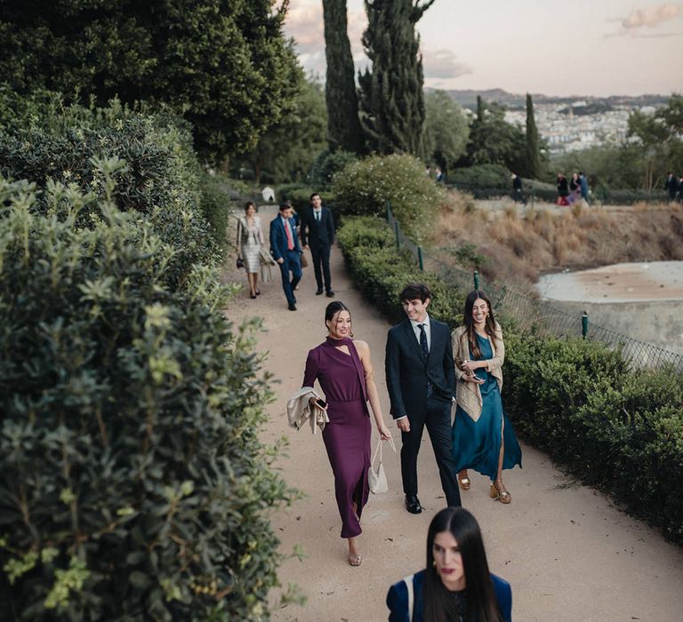 wedding guests arriving at the outdoor wedding ceremony at Hotel Cortijo Bravo, Vélez-Málaga, Málaga