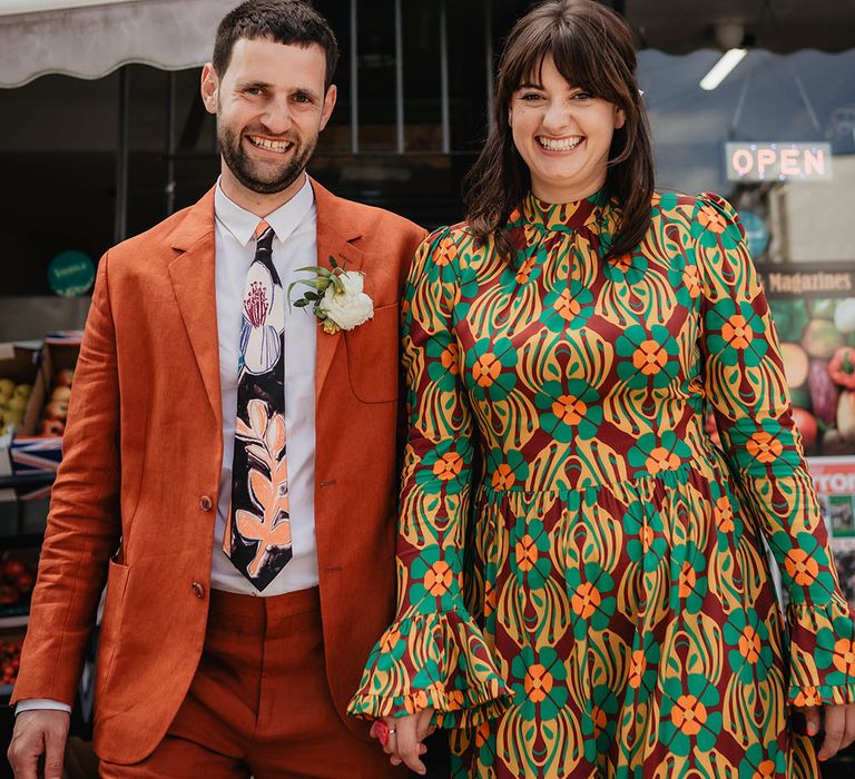 Groom in orange suit jacket for Bristol registry office wedding 