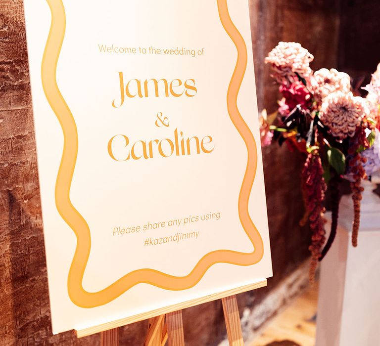 Orange wavy wedding welcome sign for country house wedding 