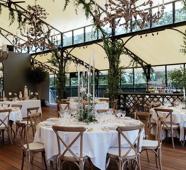 Port Lympne Wildlife Park orangery room for the wedding breakfast decorated in neutral tones 