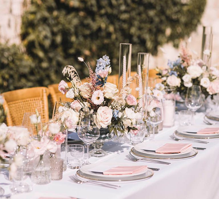 Pastel wedding tablescape for boho destination wedding in Croatia with pink place settings 