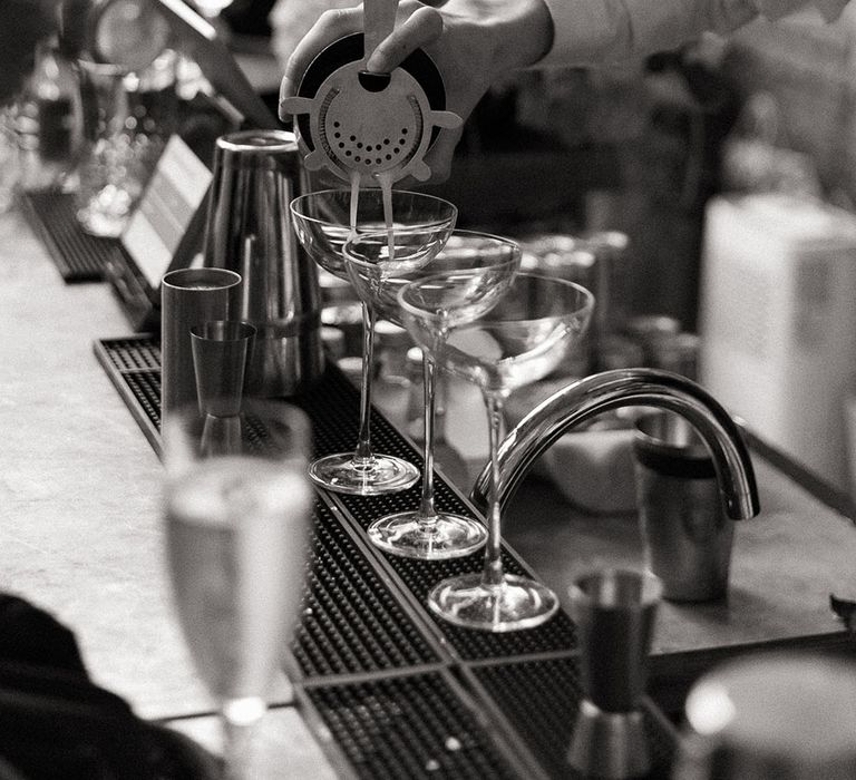 Mixologist making wedding cocktails at wedding  