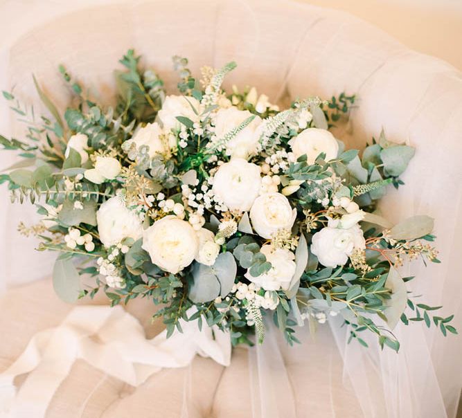 White flower and foliage winter wedding bouquet 