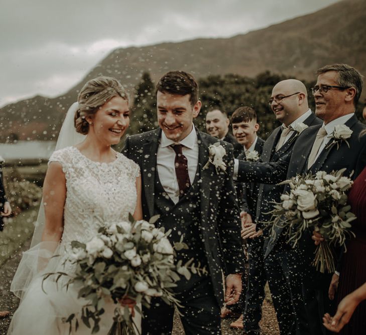 In on the lake wedding confetti moment with picturesque views